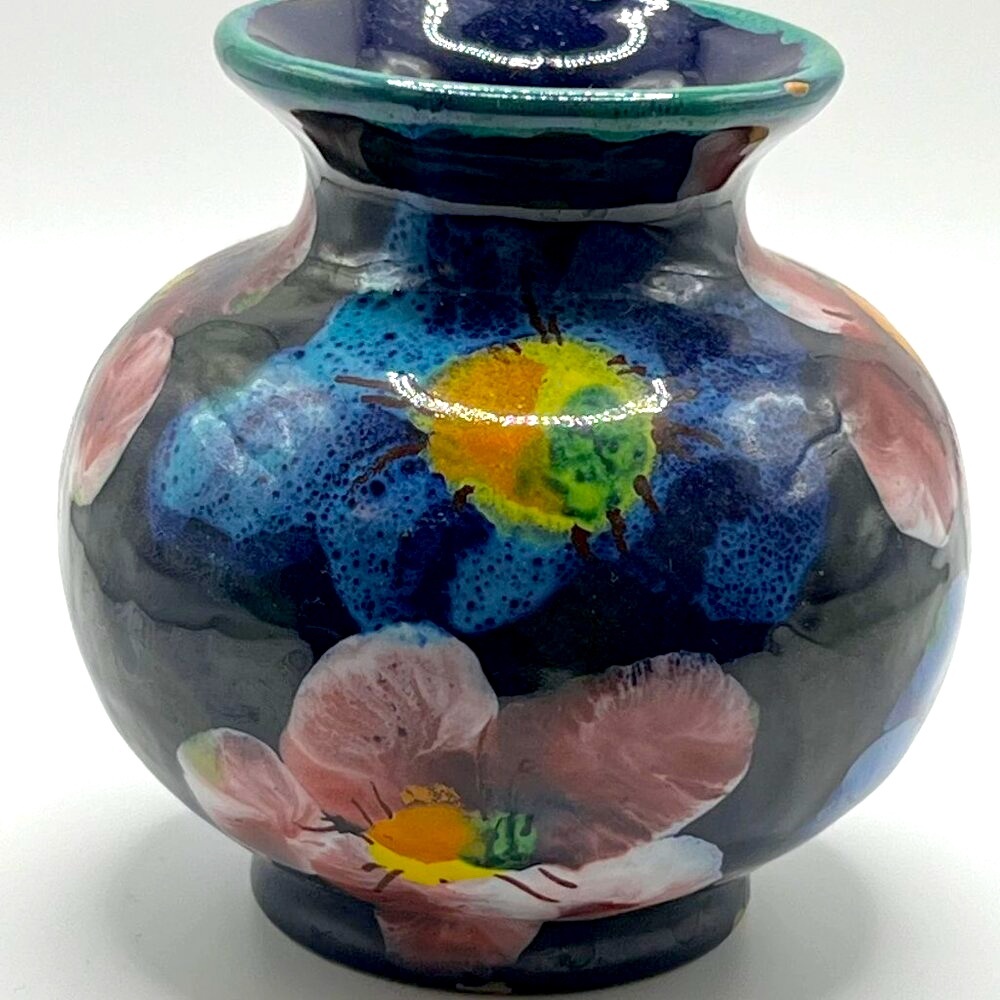 Small hand painted blue vase with signature